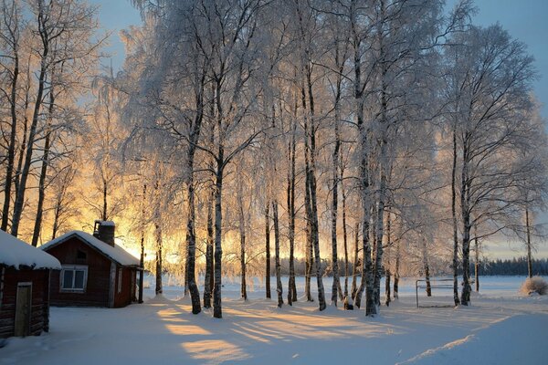 Snow-covered hut in winter in Finland