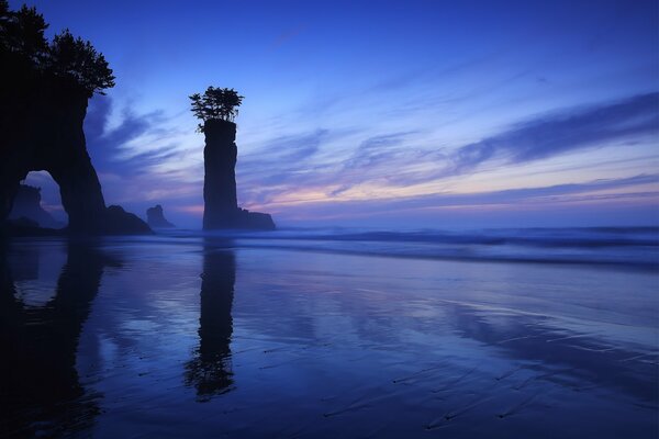 Beautiful blue sky over trees and rocks