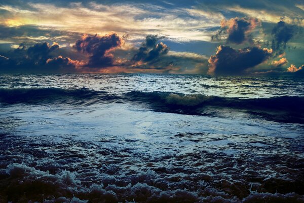 The raging sea under the clouds