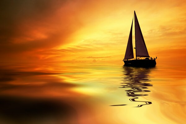 A sail sails against the background of sunset