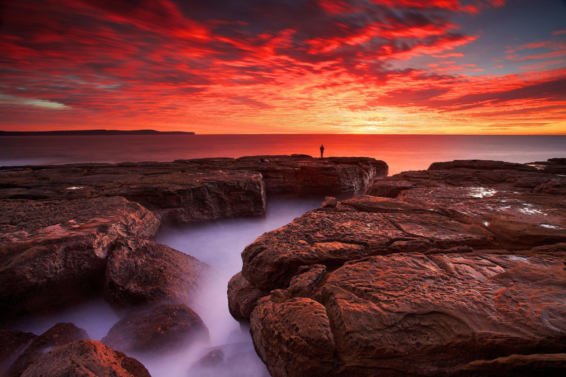 amanecer playa rocas océano