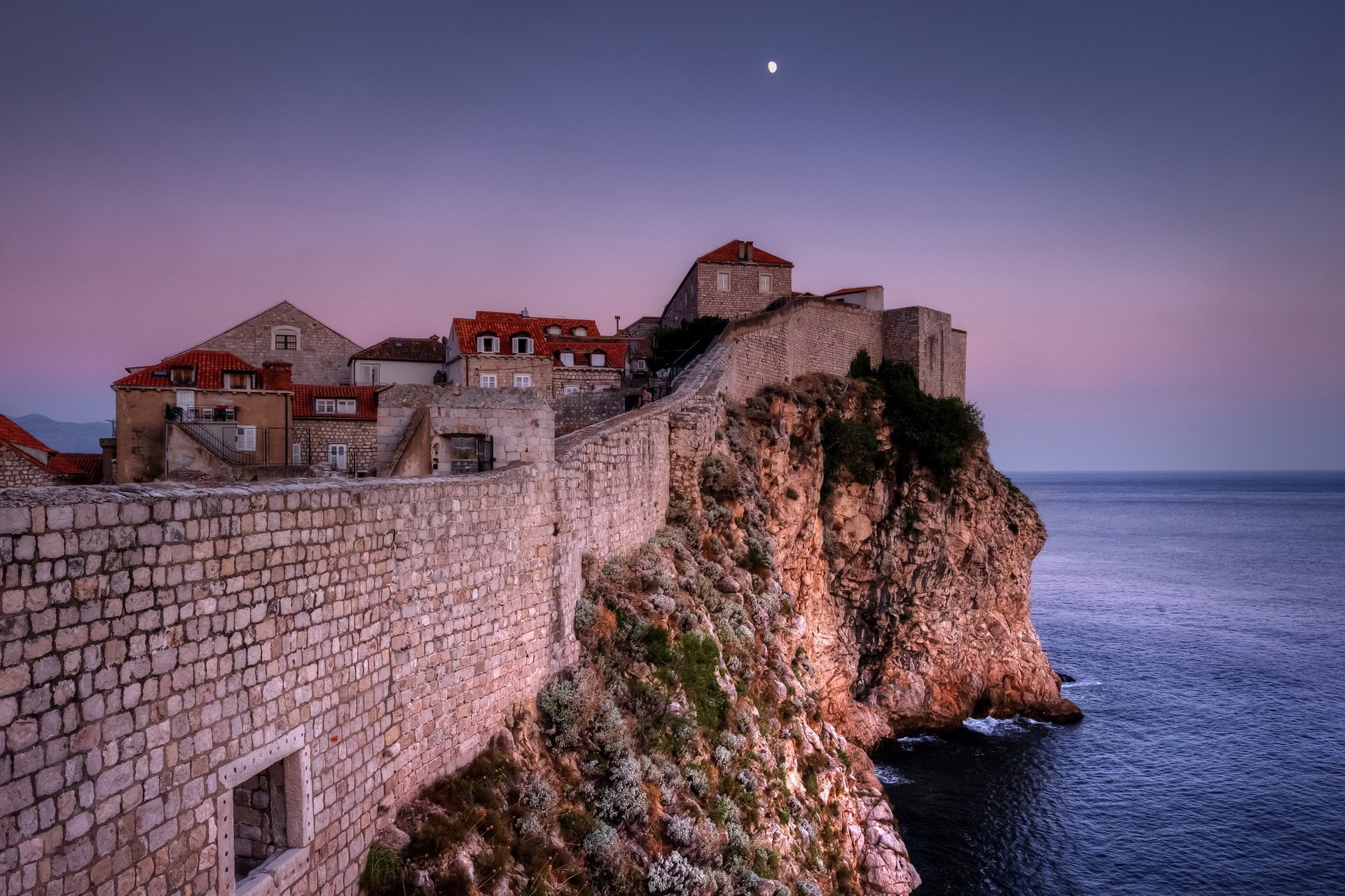 puesta de sol mar ciudad