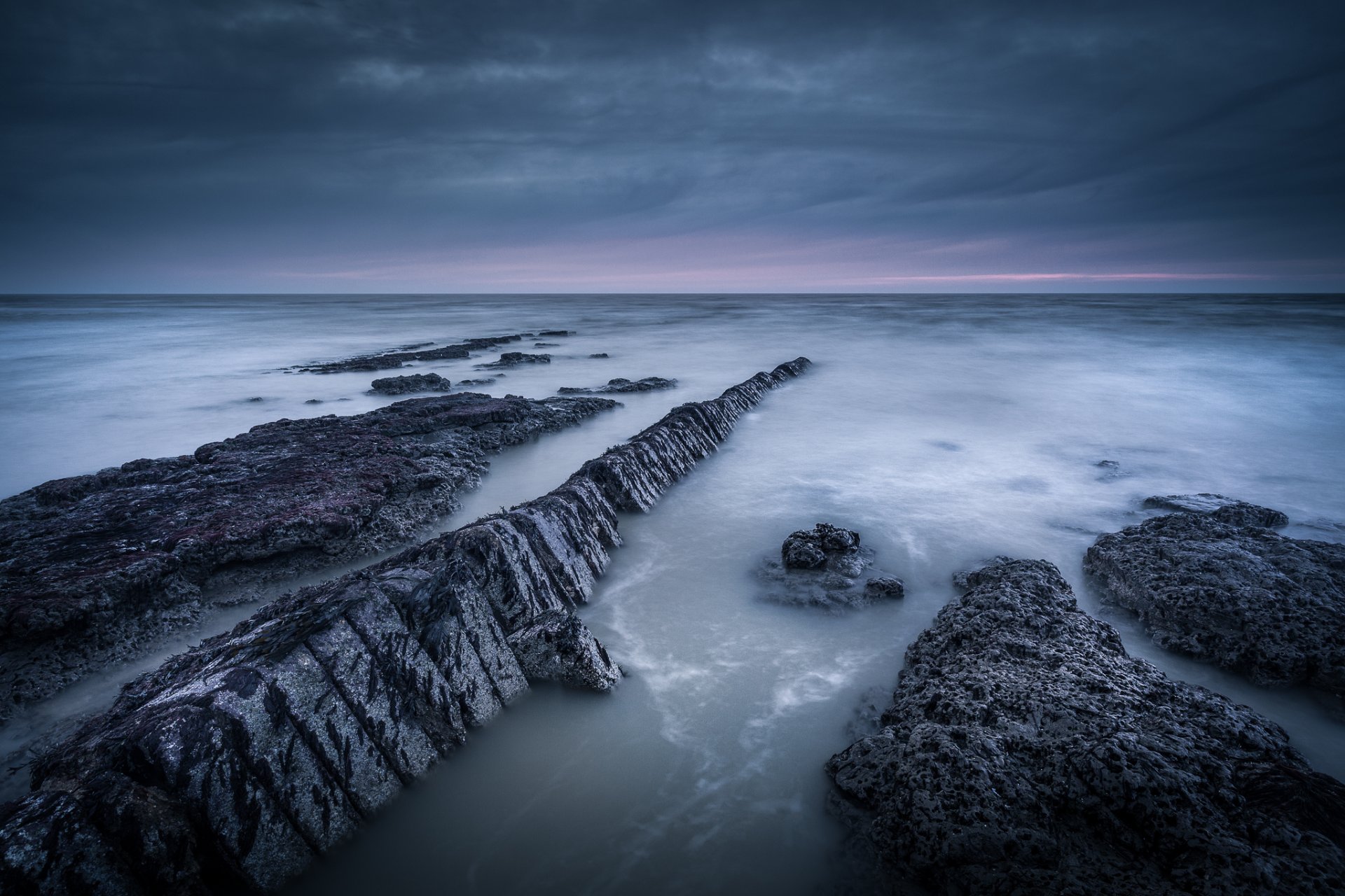 reino unido inglaterra suffolk mar del norte costa rocas tarde cielo nubes