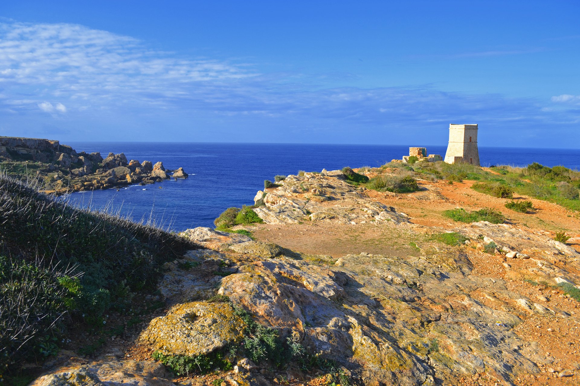 malta sky clouds sea rock bay tower