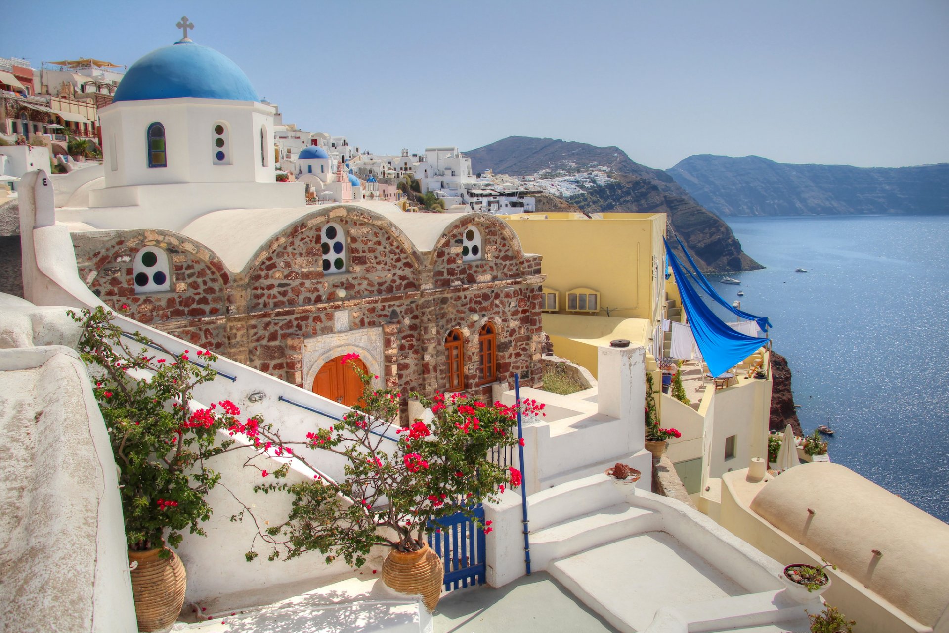 griechenland santorini himmel berge meer kirche haus hof blumen