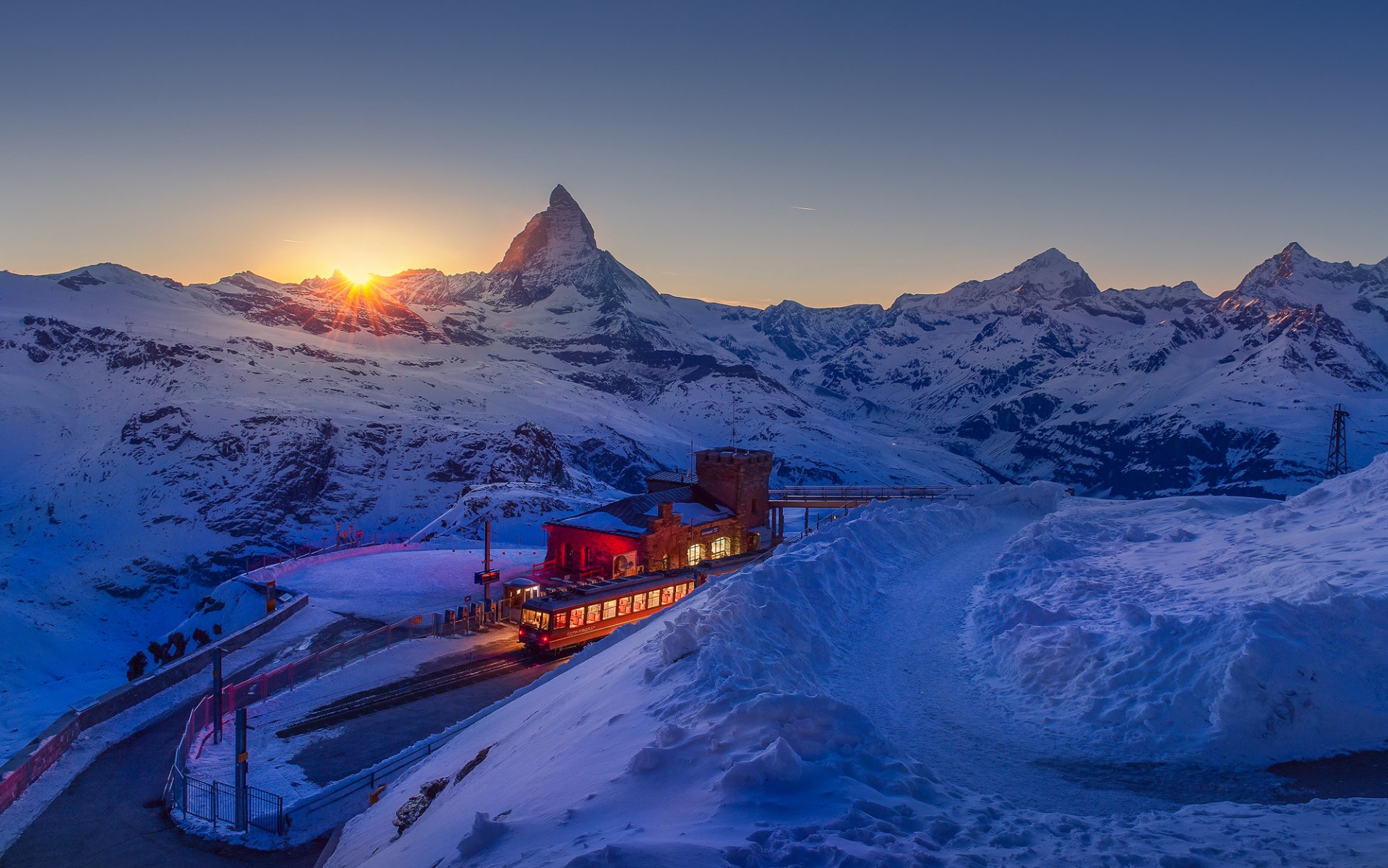 suiza alpes montañas cielo sol puesta de sol resort invierno febrero