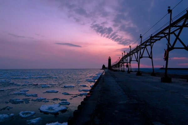 May at the pier at dawn, dawn at the pier, on the seashore, evening and the seashore