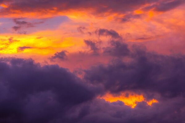 Magical sunset sky of purple and orange shades