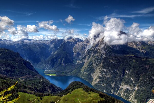 The Bavarian Alps. Top view of mountains, fields and forests