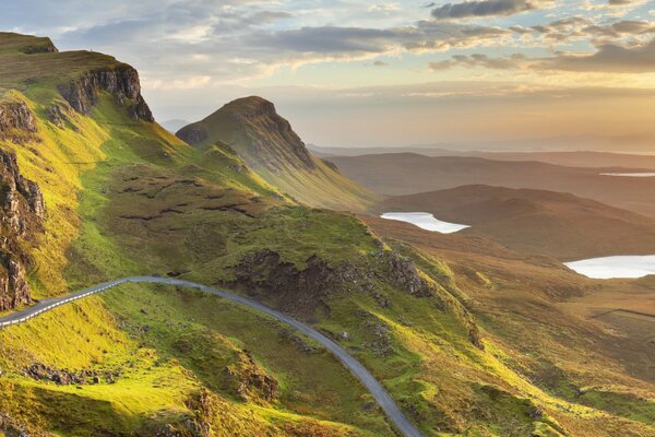 Mountain road with a beautiful sunset