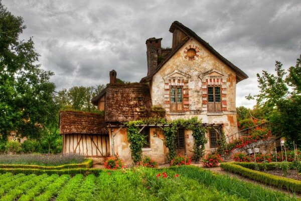 Country house against a cloudy sky