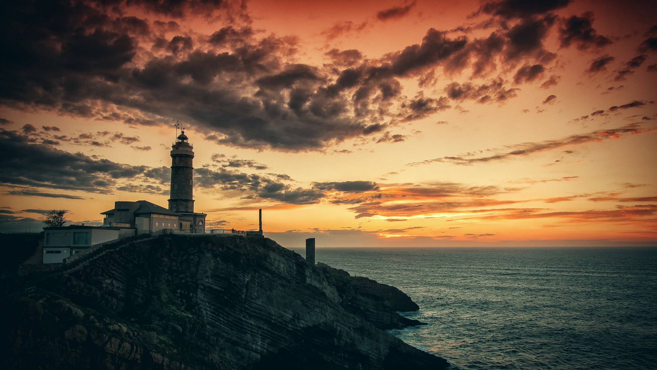 mar roca faro mañana amanecer