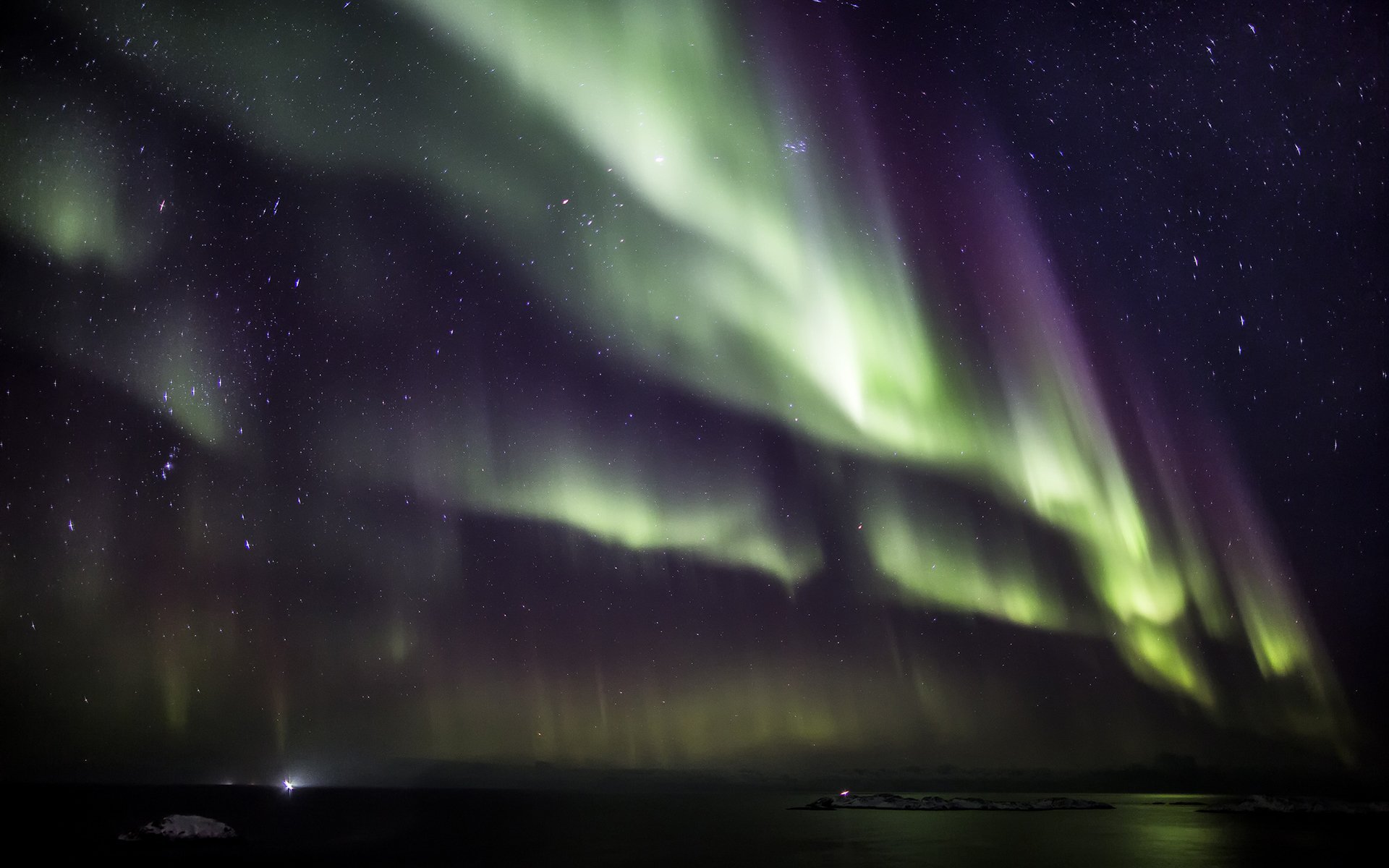 aurora borealis northern lights night water snow star