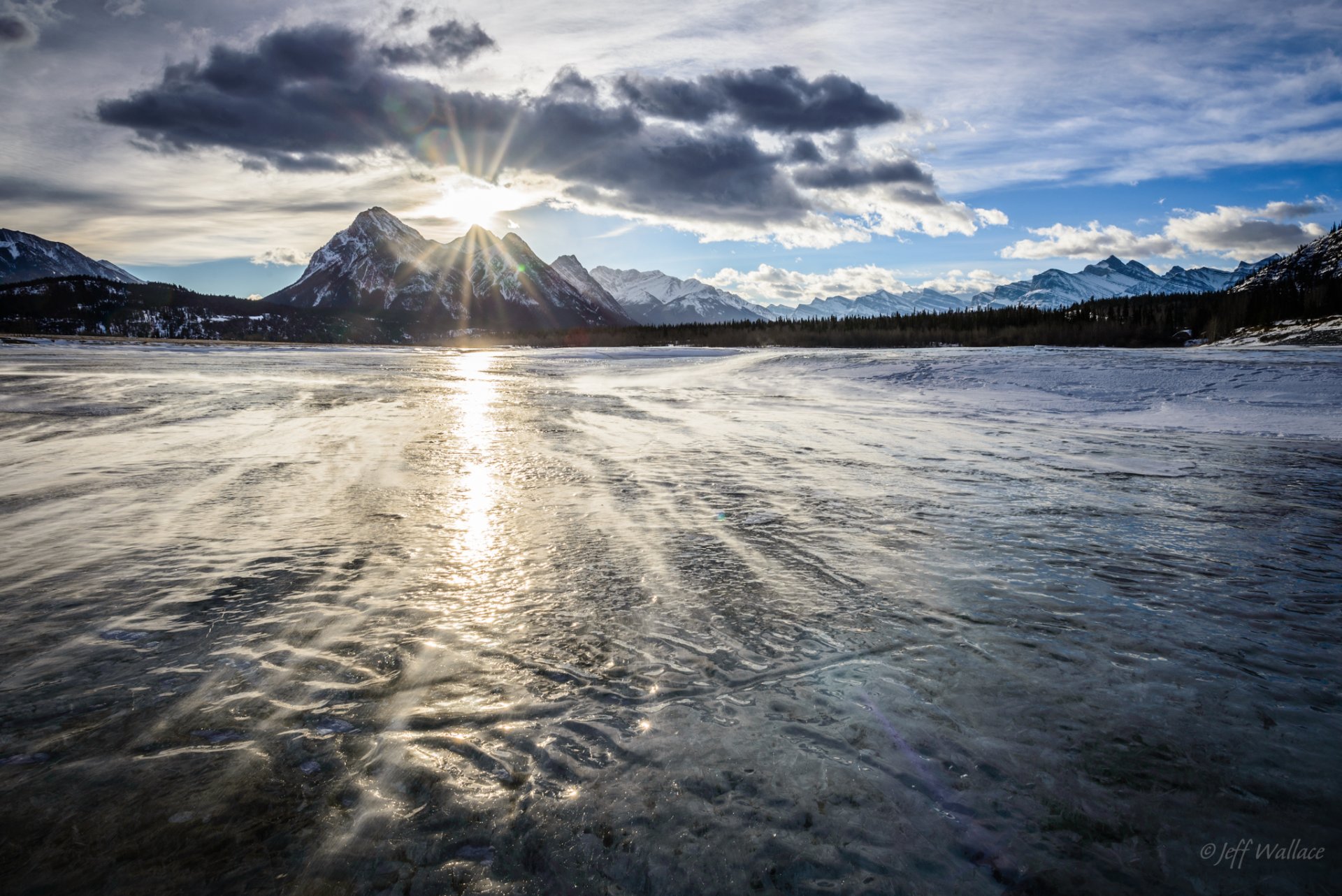 paysage mer soleil réflexion montagnes ciel nuages