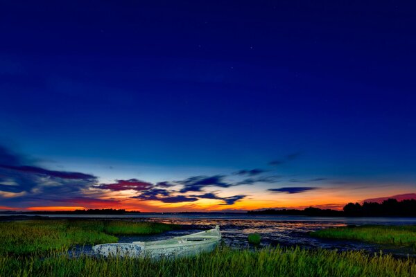 An extraordinary sunset over the evening lake