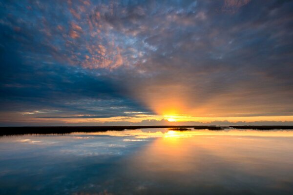 Beautiful sunset on the sea horizon