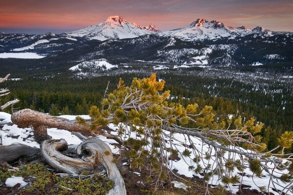 Landscape of mountains with water and sunset