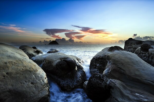 Landscape sea boulders and dawn