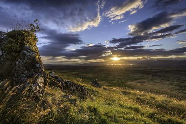 Sunset in Scotland with clouds in the afternoon