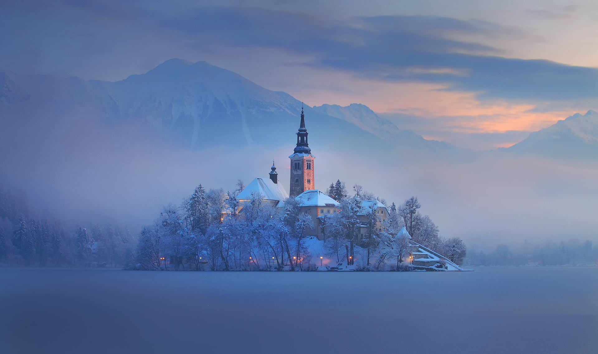 lovenia bled lake mountain island fog house church winter