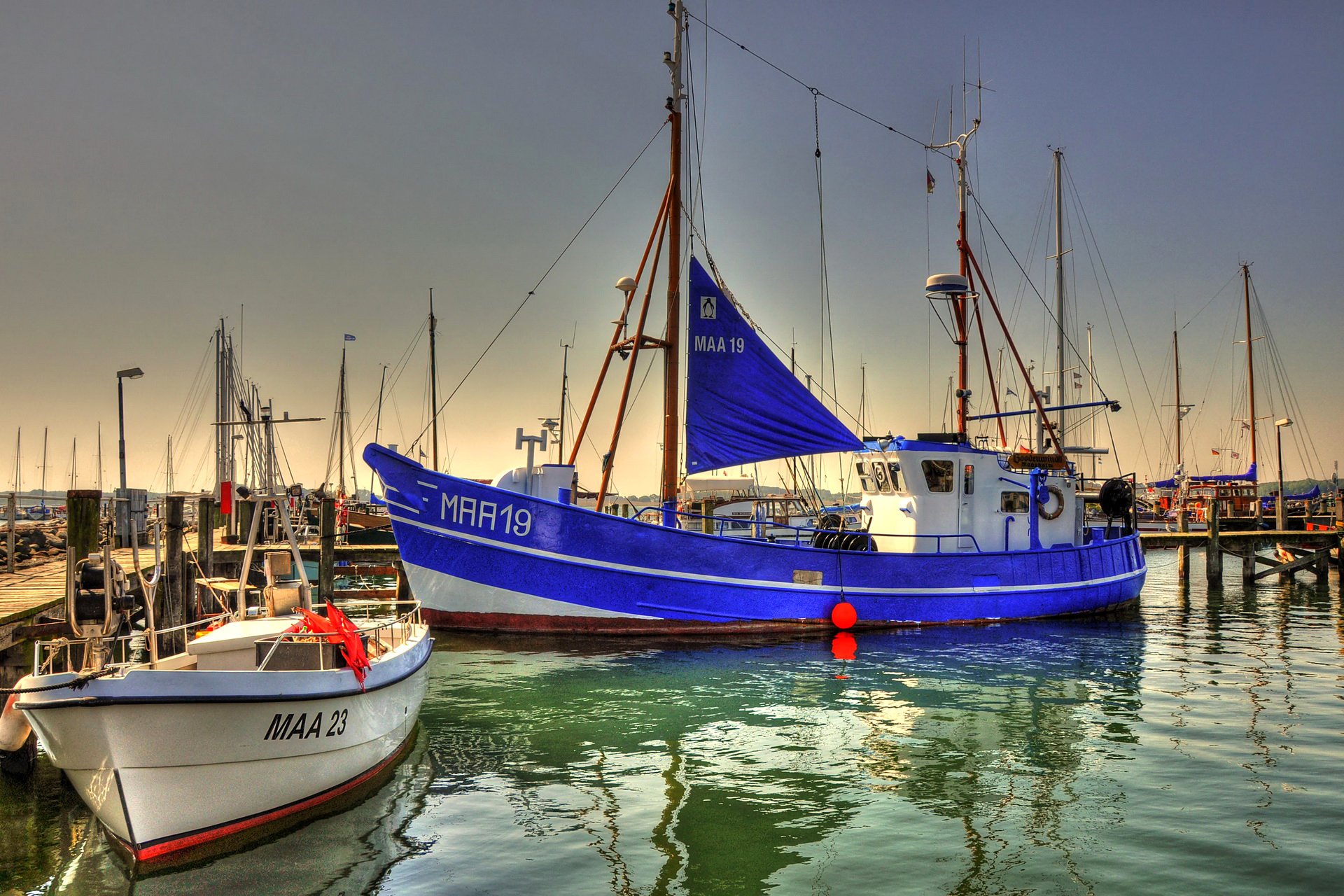 maasholm germany the port pier wharf boat yacht mast house sky town