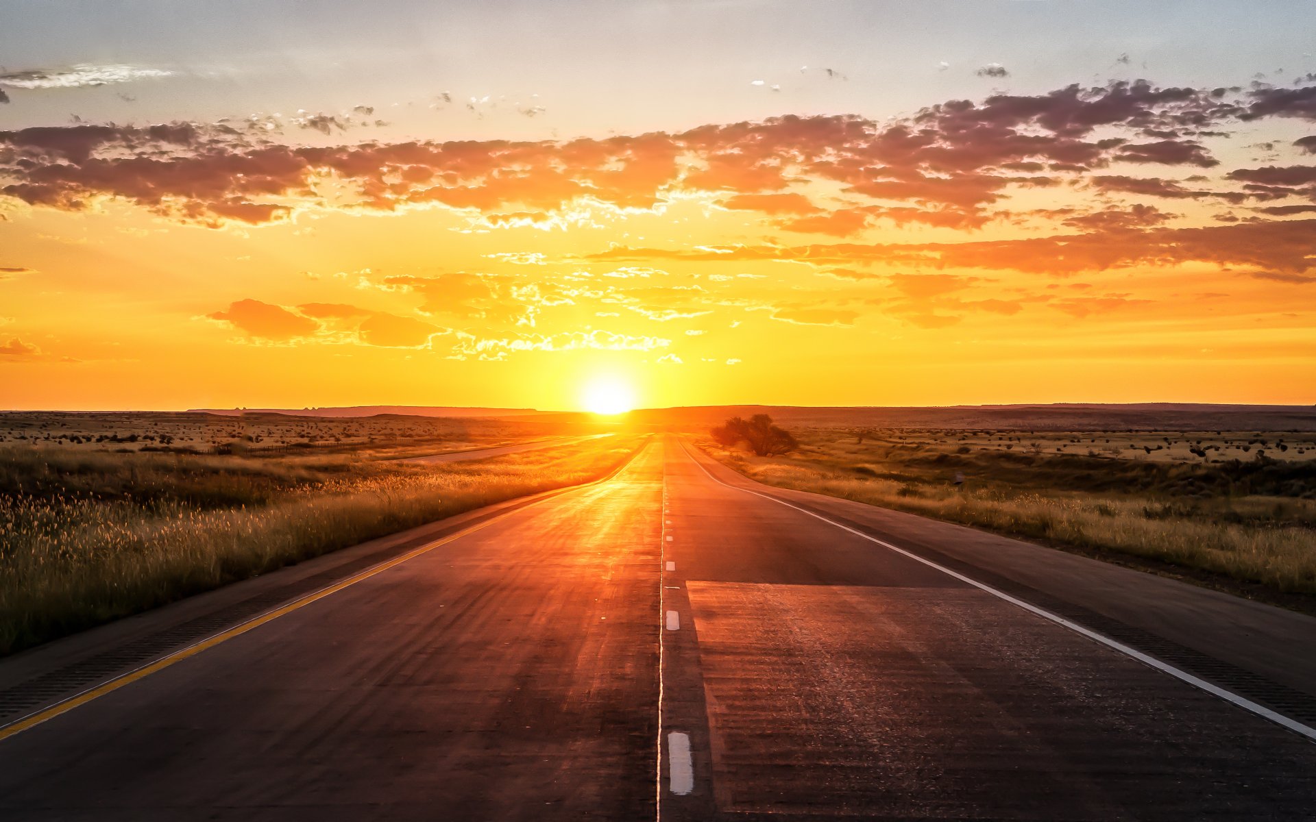 road sunset clouds orange sky