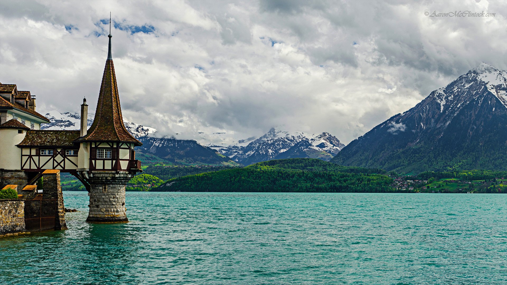 oberhofen oberhofen switzerland sky mountains lake tower