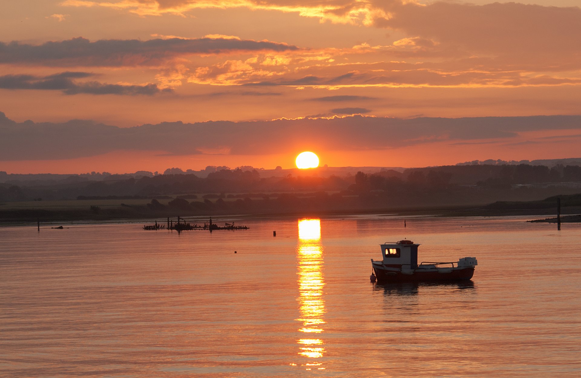 lake boat sunset