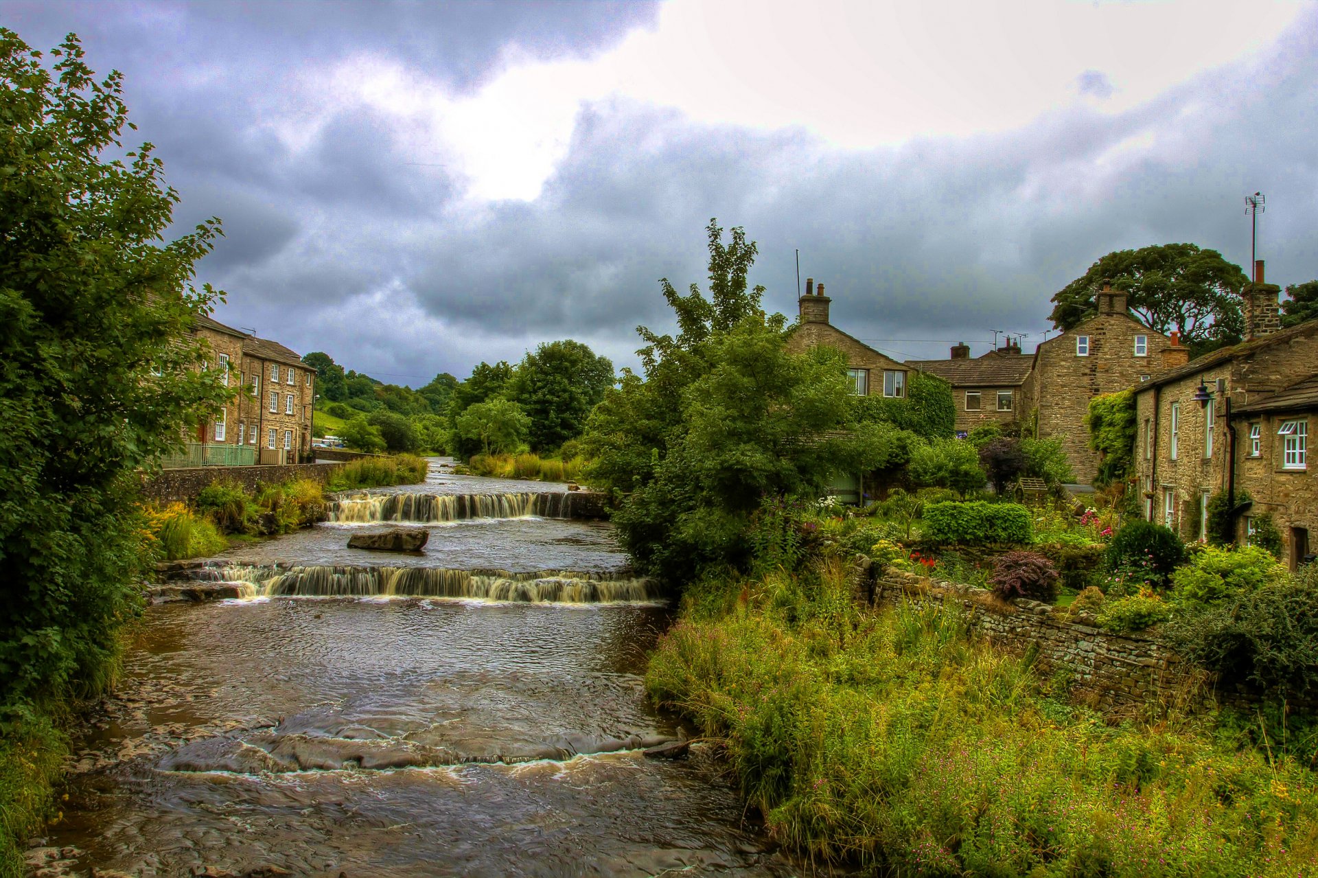 north yorkshire england sky clouds river stage house town tree