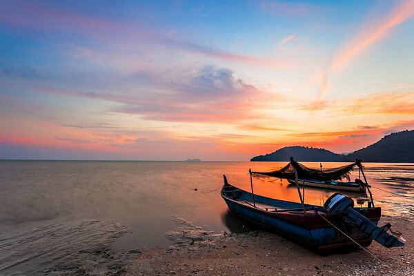 The boat is moored in the sea