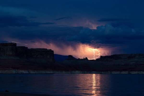 Night landscape of the sea with a thunderstorm