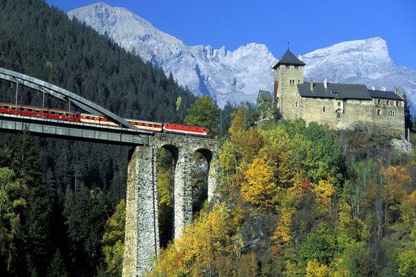 Castle and bridge among the trees in the mountains of Austria