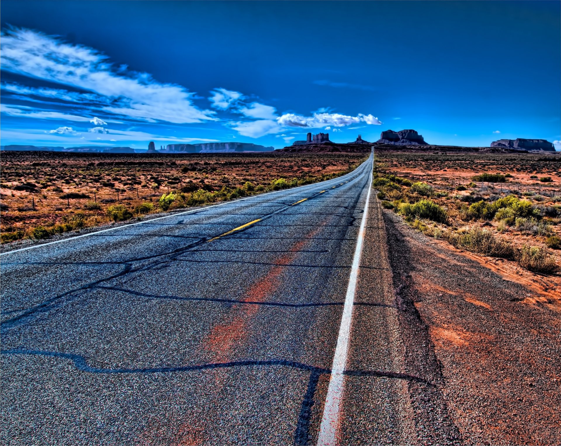 monument valley usa road sky clouds mountains monuments nature prairie