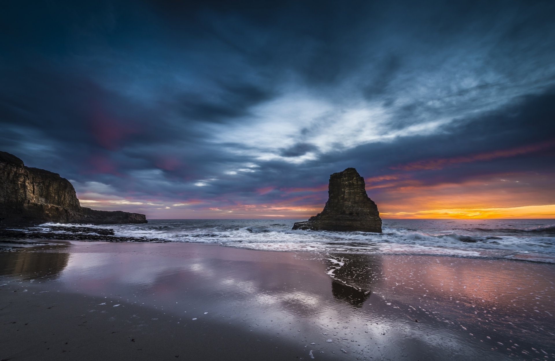 oceano tramonto rocce nuvole