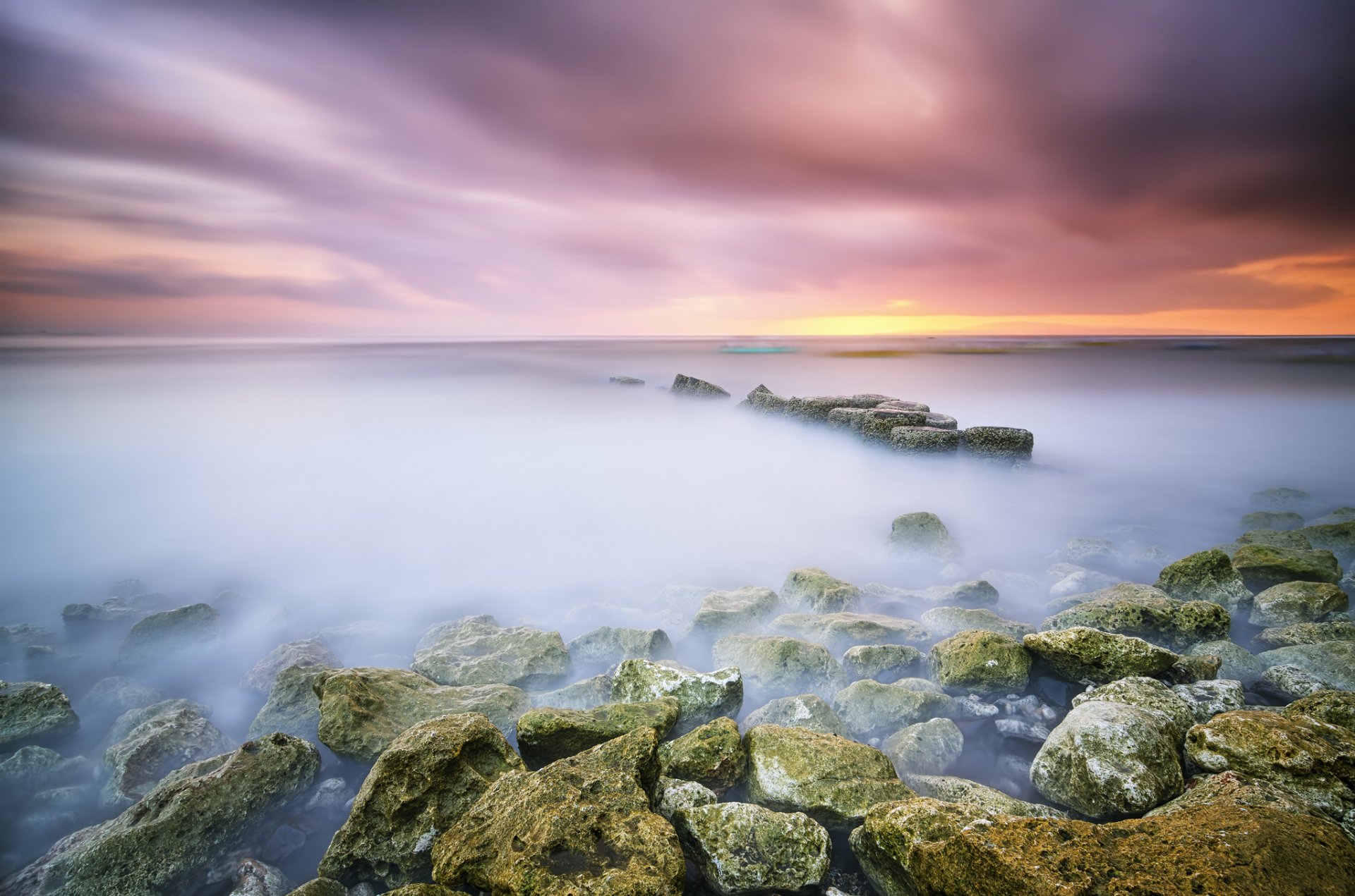 matahari terbit strand sanur bali indonesien steine ozean belichtung dämmerung