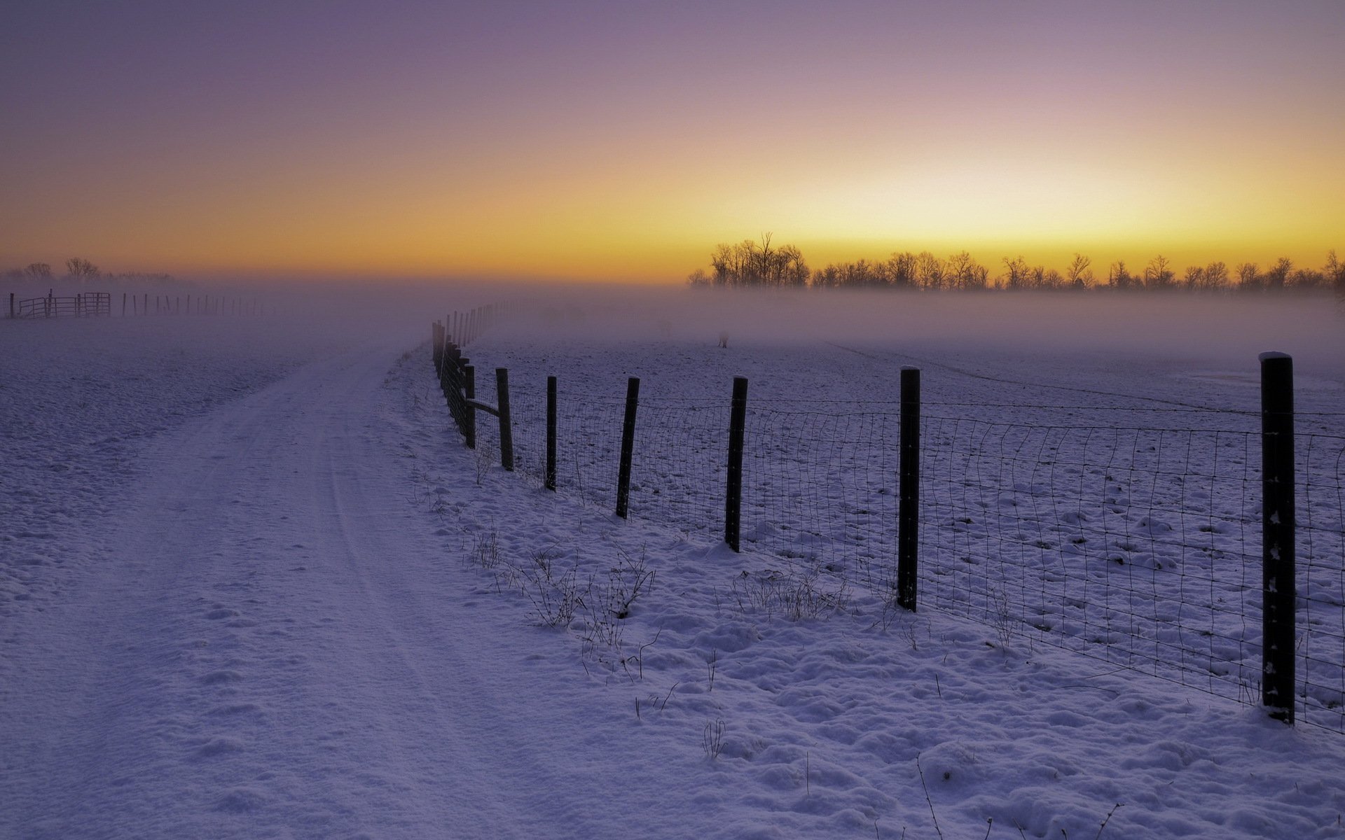 sonnenuntergang winter landschaft zaun straße