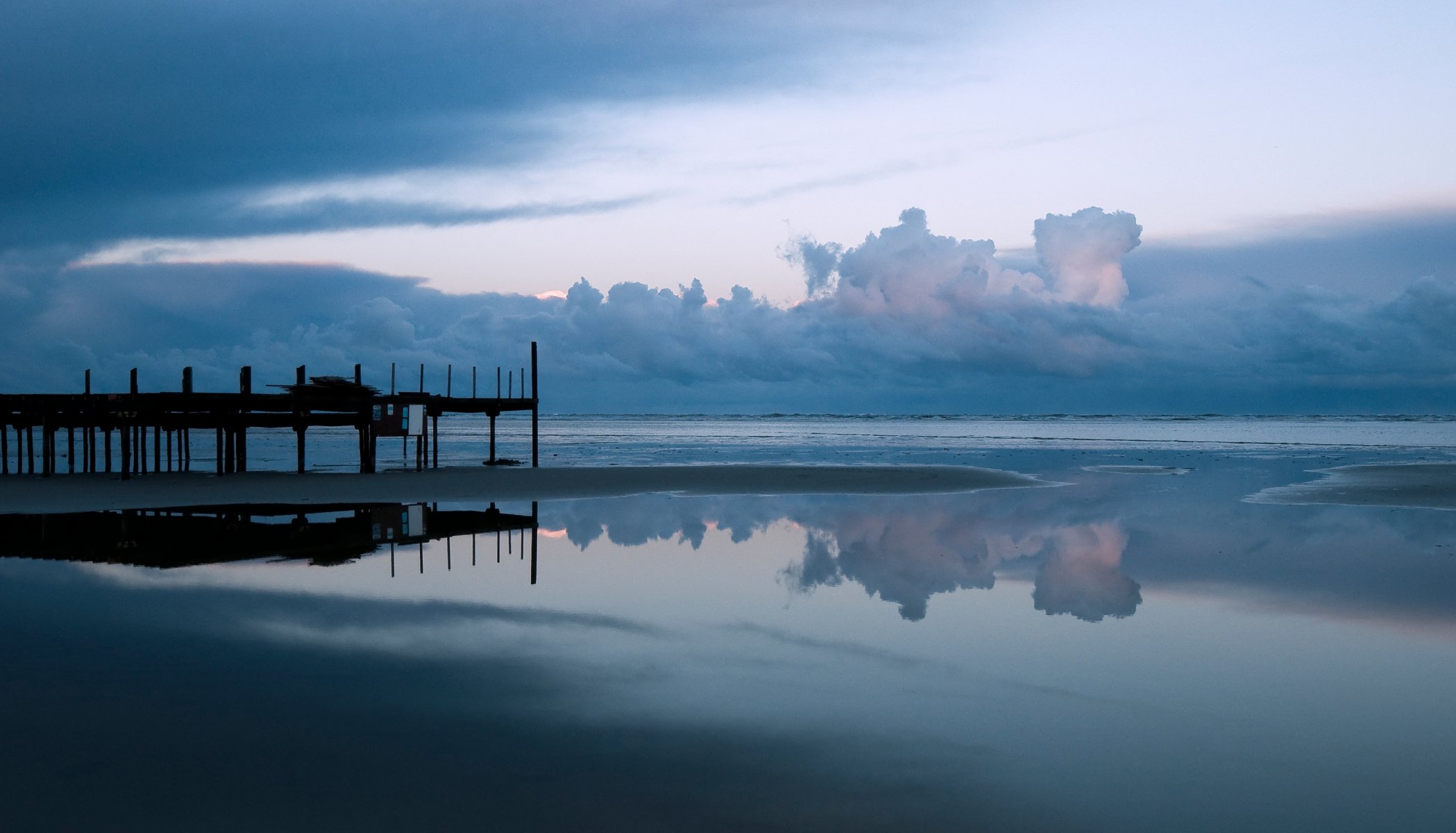 playa océano agua cielo nubes puente horizonte