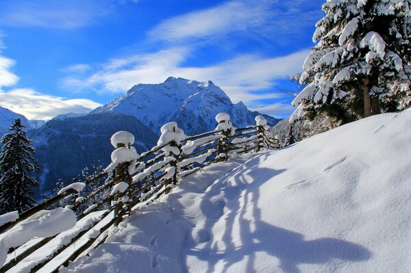 Snow-covered trail on the hill