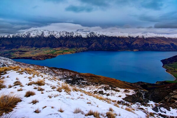 Winter landscape. Mountains and lake