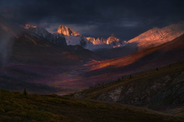 Sunset in the valley of the mountains