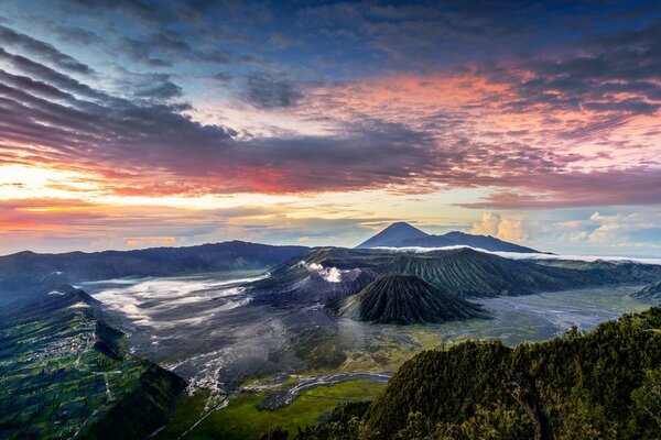 Volcanic complex of Indonesia. Beautiful clouds