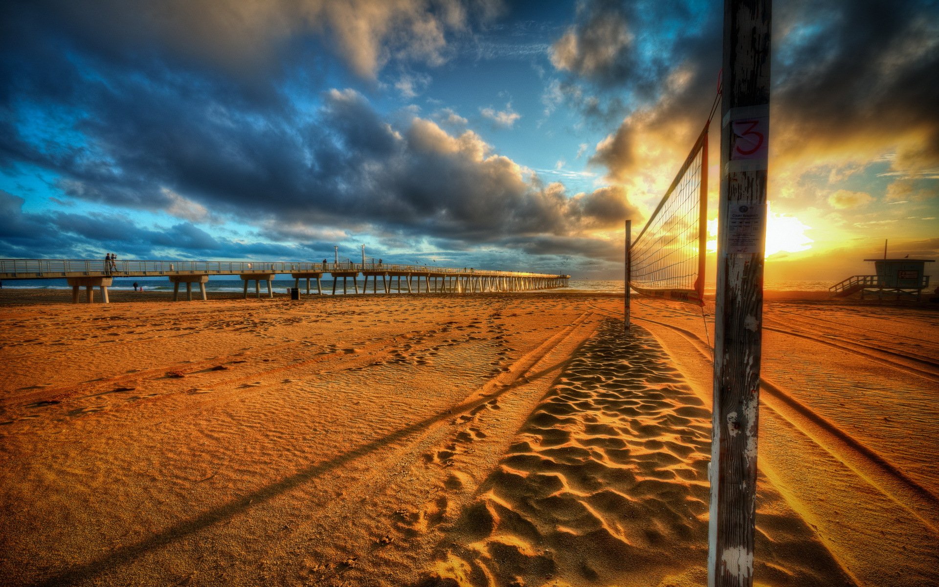 unset sea beach bridge