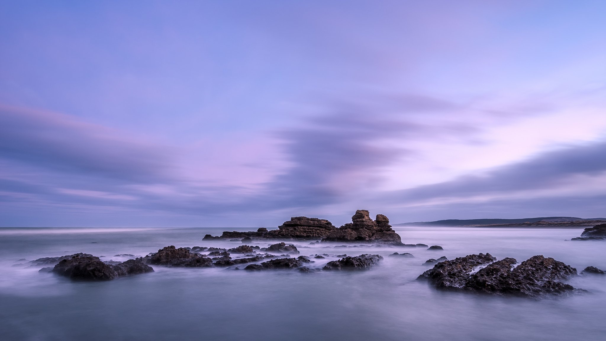 neuseeland tasmanisches meer küste steine abend flieder himmel wolken