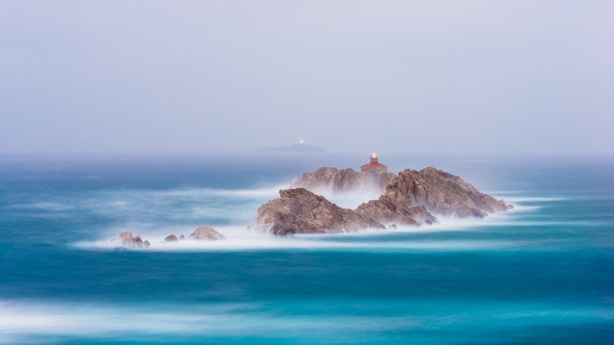 mar rocas faros exposición