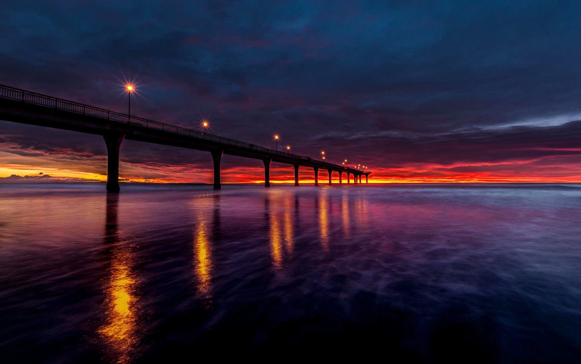 new zealand gulf water pier lamps sunrise sky flower