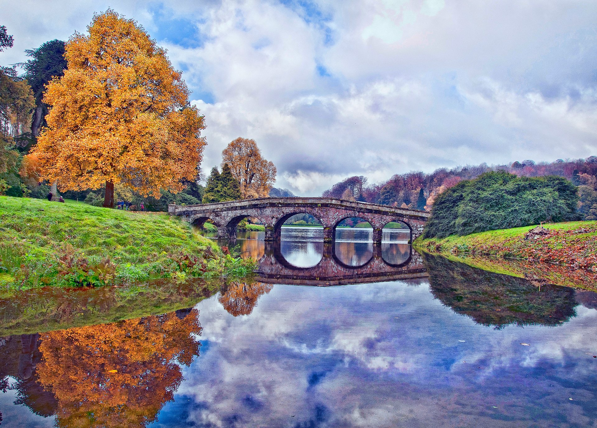 wiltshire england sky clouds tree autumn bridge pond