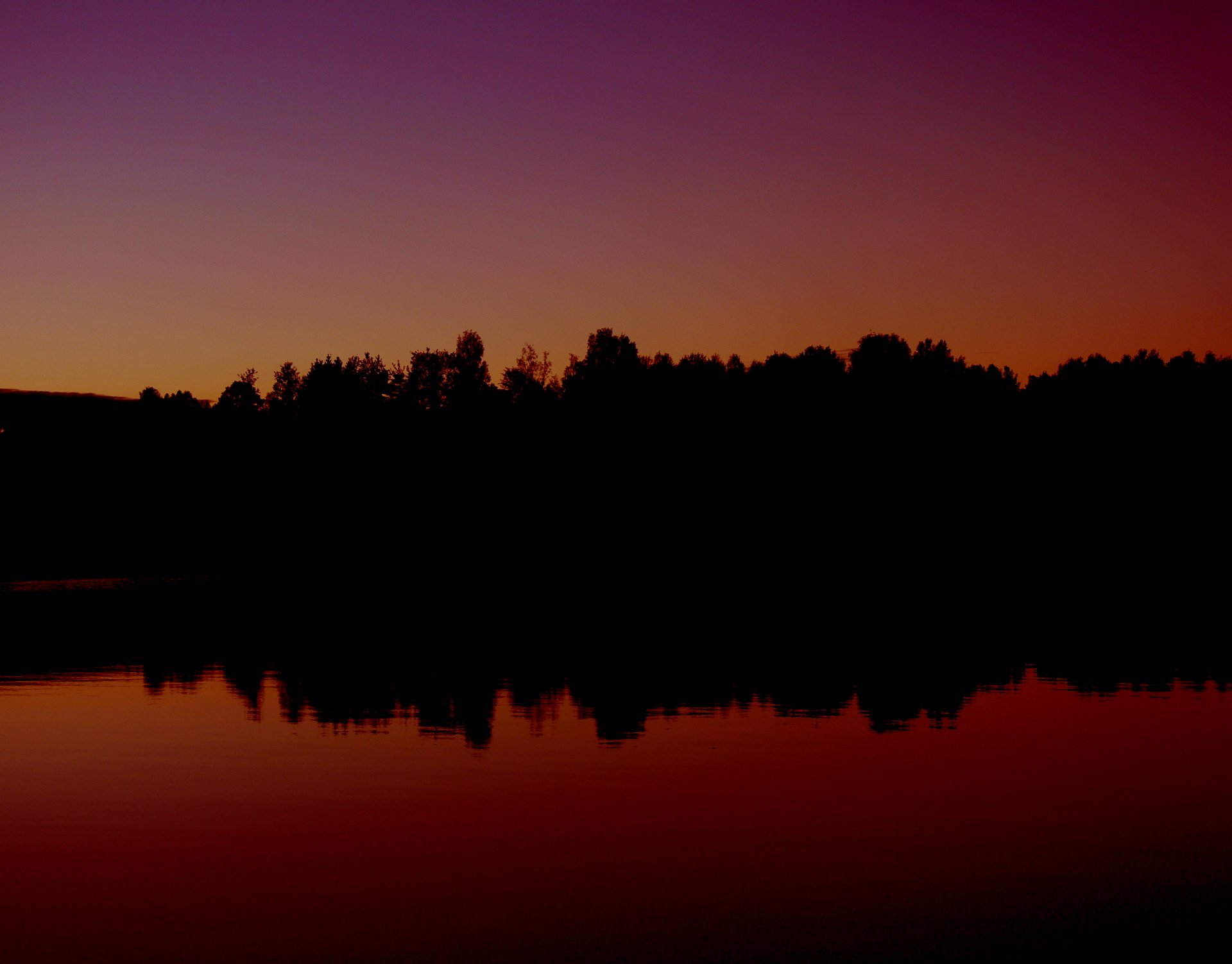 puesta de sol lago bosque