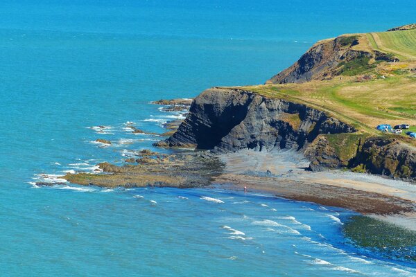 Rocky coast towering over the Lazuli Sea