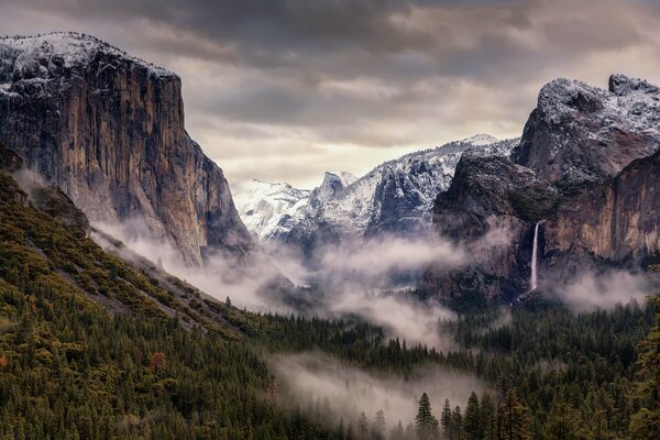 Snowy mountains and forest in Yosemite National Park, USA, California