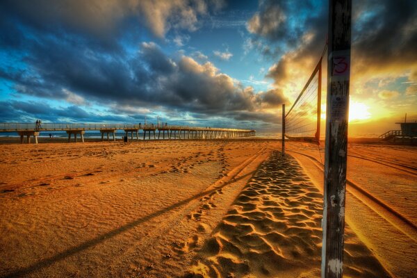 Warm sunset on the beach and sea view